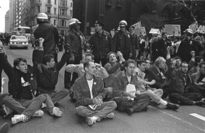 Peter Staley participating in an ACT UP sit-in in the late 1980s. Photo by Clay Walker 