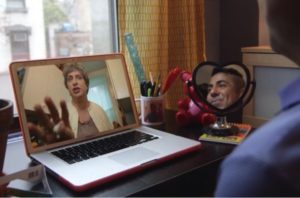 Mama (Tyne Firmin) Skypes with Merce. Photo courtesy T. Firmin
