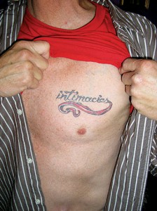 Written on the body: Michael shows off one of his tattoos. Photo courtesy M. Kearns